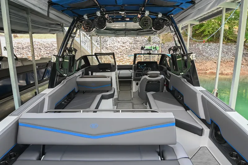 Slide: The Image of 2022 Cobalt R8 Surf boat interior with modern seating and advanced controls. - 9