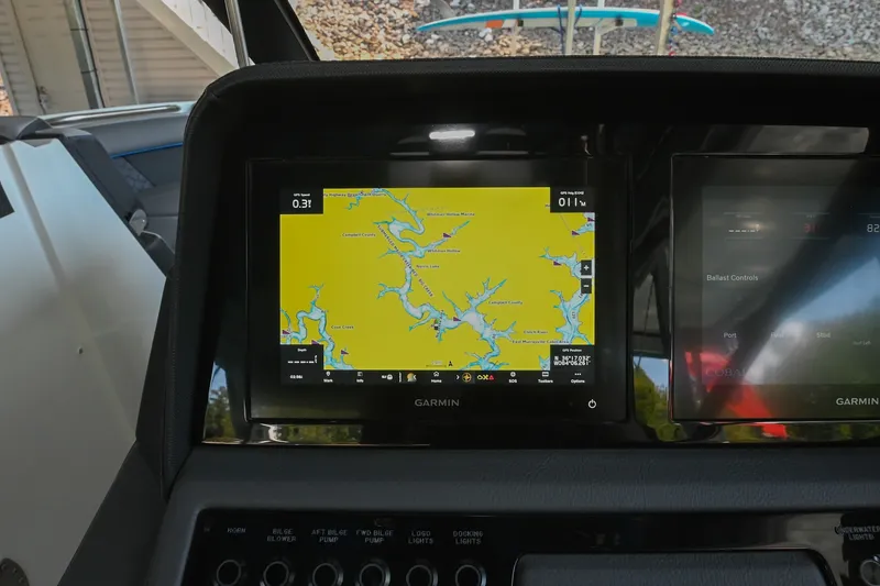 Slide: The Image of Garmin navigation display on 2022 Cobalt R8 Surf boat dashboard. - 37