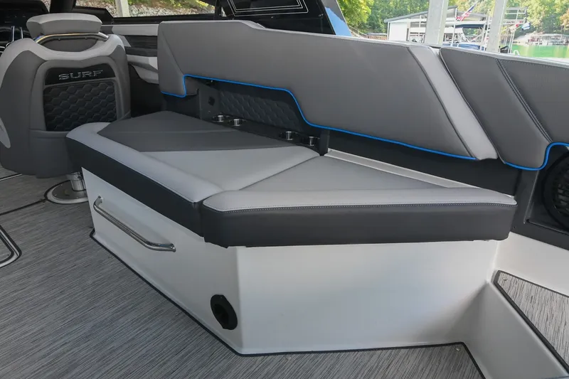 Slide: The Image of 2022 Cobalt R8 Surf boat interior with sleek gray seating and modern design. - 25