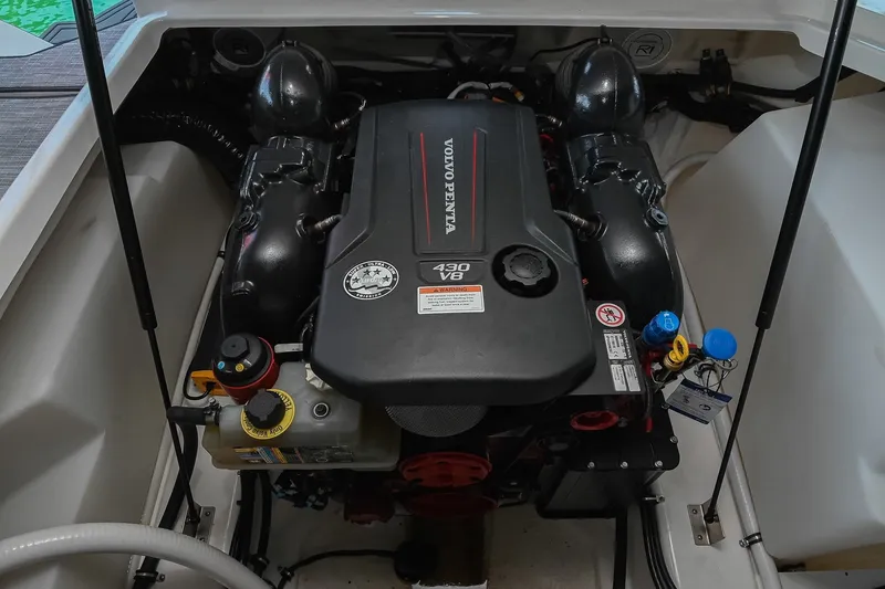Slide: The Image of 2022 Cobalt R8 Surf boat engine compartment featuring a Volvo Penta 430 V8 engine. - 52