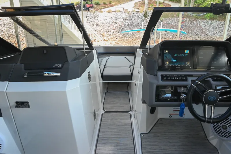 Slide: The Image of 2022 Cobalt R8 Surf boat interior with modern dashboard and steering wheel. - 41