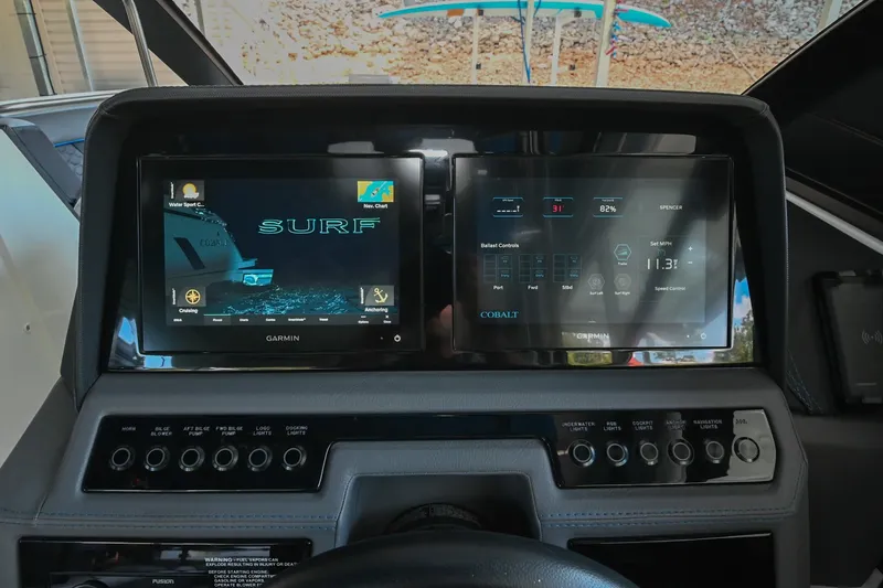 Slide: The Image of Dashboard of 2022 Cobalt R8 Surf boat with dual Garmin displays. - 36