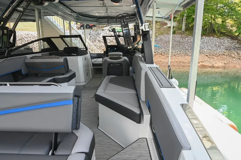 Slide: The Image of 2022 Cobalt R8 Surf boat interior with modern seating and sleek design. - 12