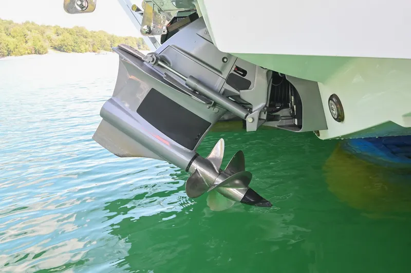 Slide: The Image of 2022 Cobalt R8 Surf boat propeller in clear green water. - 53