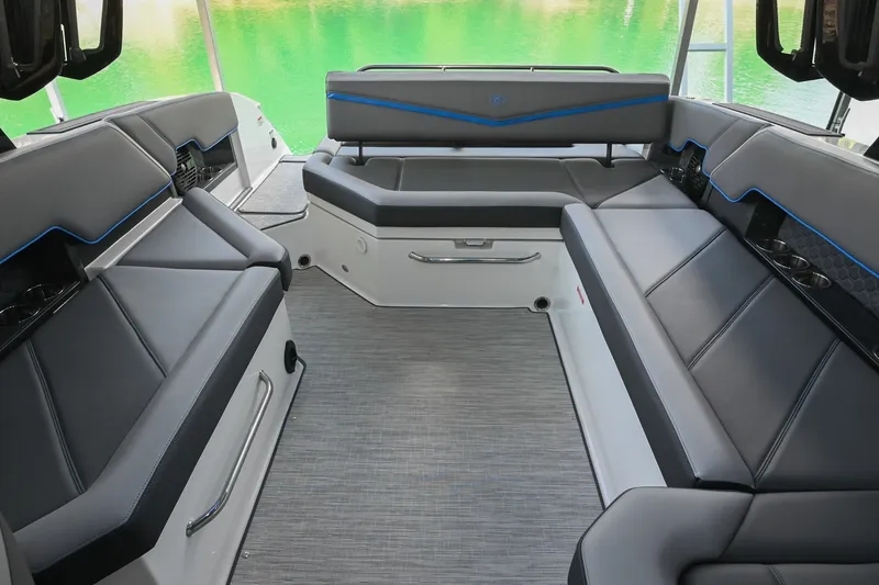 Slide: The Image of Interior of 2022 Cobalt R8 Surf boat with sleek seating and modern design. - 17