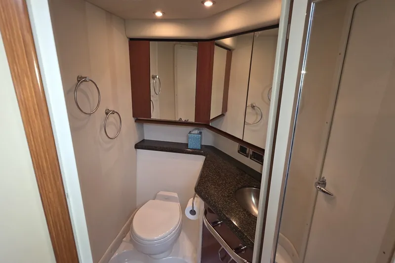 Slide: The Image of Luxurious bathroom in 2005 Sea Ray 550 Sedan Bridge yacht with modern fixtures. - 49