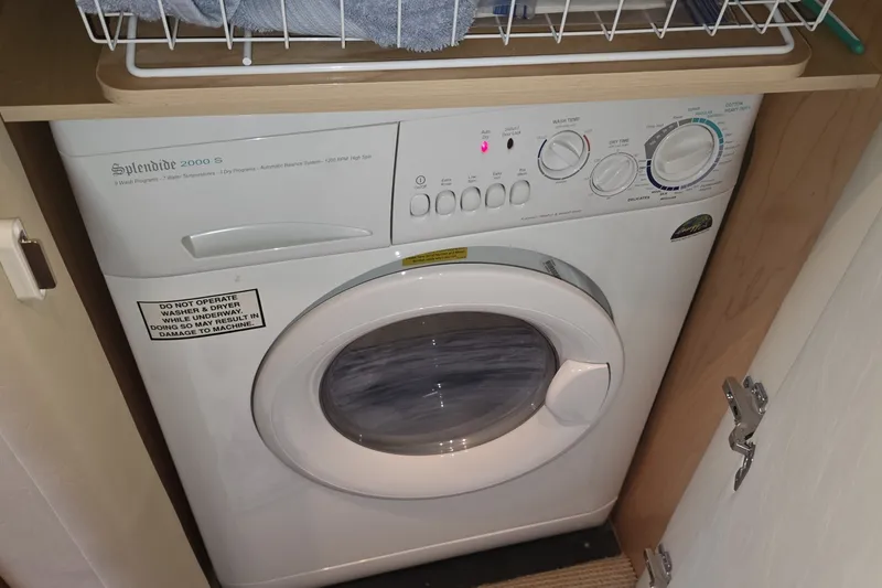 Slide: The Image of Splendide 2000 S washer-dryer in 2005 Sea Ray 550 Sedan Bridge yacht. - 52