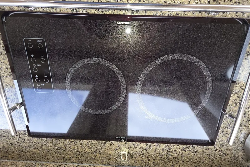 Slide: The Image of Kenyon electric cooktop on 2005 Sea Ray 550 Sedan Bridge yacht kitchen counter. - 34