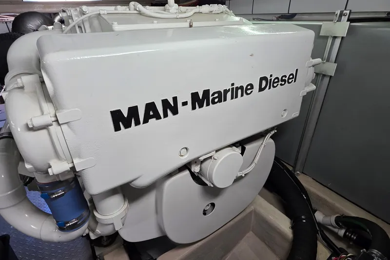Slide: The Image of MAN Marine Diesel engine in a 2005 Sea Ray 550 Sedan Bridge yacht. - 70