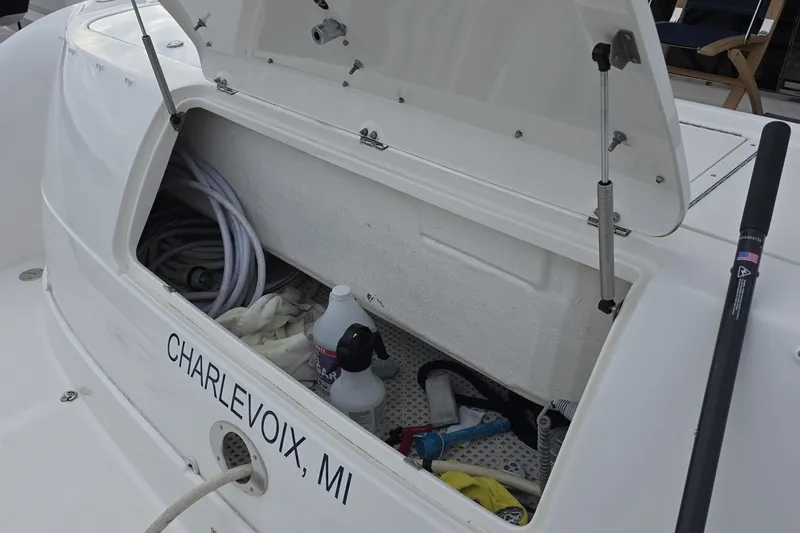 Slide: The Image of Open storage compartment on 2005 Sea Ray 550 Sedan Bridge, Charlevoix, MI. - 17