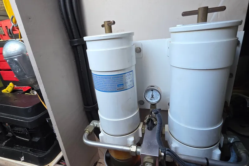 Slide: The Image of Fuel filter system on a 2005 Sea Ray 550 Sedan Bridge yacht. - 83