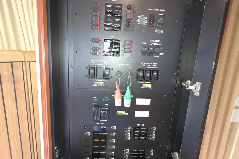Slide: The Image of Electrical control panel on a 2005 Sea Ray 550 Sedan Bridge yacht. - 53