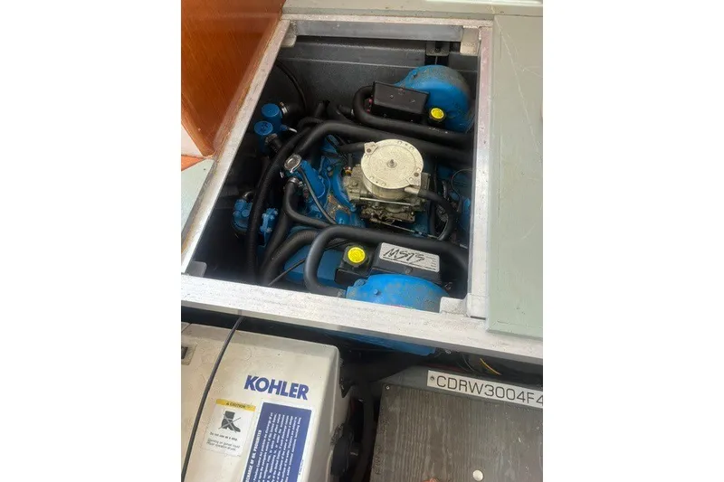 Slide: The Image of Engine compartment of a 1995 Carver 355 Aft Cabin Motor Yacht with Kohler generator. - 29