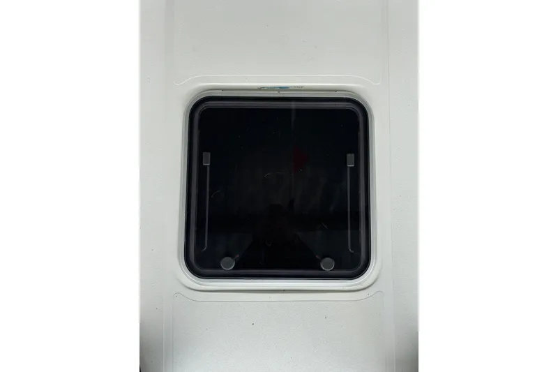 Slide: The Image of Square window on a 1992 Tiara Sport 270 Sport boat. - 9