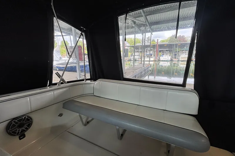 Slide: The Image of Interior of 1992 Tiara Sport 270 Sport boat with seating and marina view. - 6