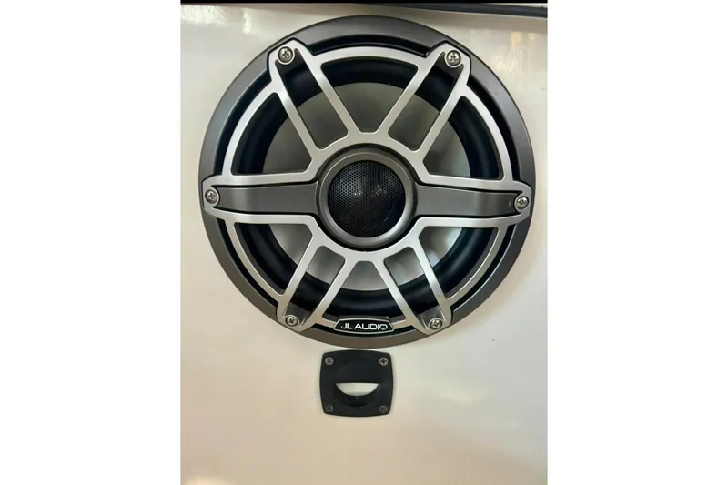 Slide: The Image of JL Audio speaker on 1992 Tiara 270 Sport boat, featuring sleek metallic design. - 18