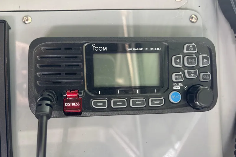 Slide: The Image of VHF marine radio IC-M330 on a 1992 Tiara 270 Sport boat dashboard. - 14