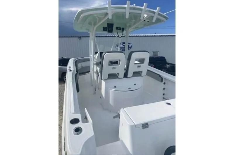 Slide: The Image of 2021 Aquasport 2500 Center Console boat with spacious deck and modern seating. - 22