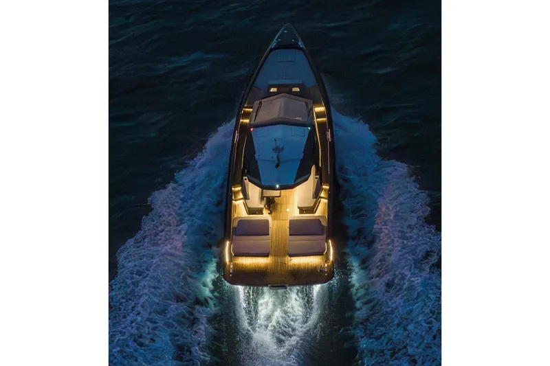Slide: The Image of Aerial view of 2027 Wally wallypower50 yacht cruising at night with illuminated deck. - 15
