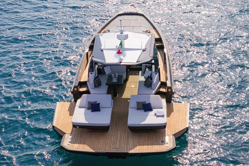 Slide: The Image of Luxurious 2027 Wally wallypower50 yacht on sparkling blue water, featuring elegant deck seating. - 18