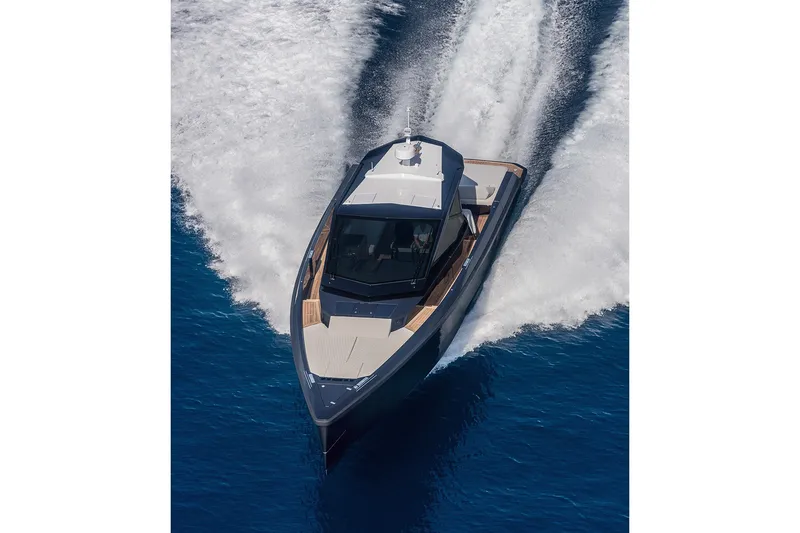 Slide: The Image of Futuristic 2027 Wally wallypower50 yacht cruising swiftly on open blue waters. - 8