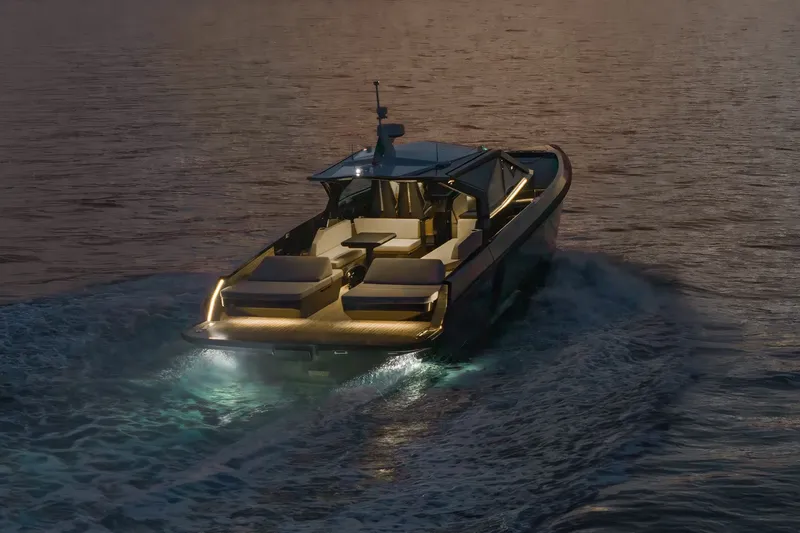 Slide: The Image of Luxurious 2027 Wally wallypower50 yacht cruising at sunset with elegant deck lighting. - 16