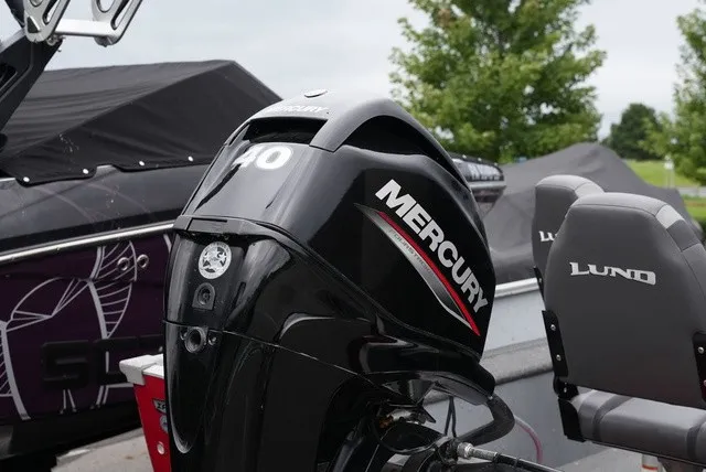 Slide: The Image of A 2023 Lund 1600 Fury SS with a Mercury 40 HP outboard motor. - 3
