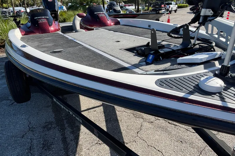 Slide: The Image of 2007 Ranger Z21 Comanche boat with dual seats and fishing equipment on trailer. - 2