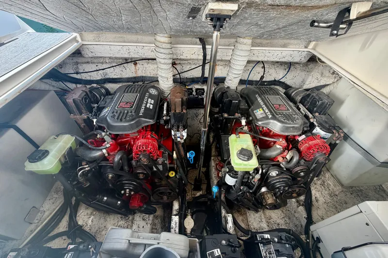 Slide: The Image of Engine compartment of a 2006 Rinker 320 Express Cruiser with dual Volvo Penta engines. - 43