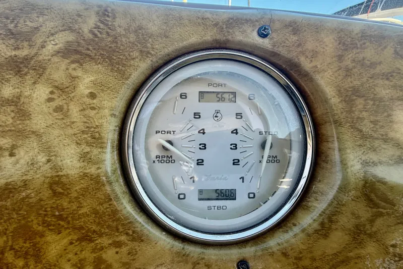 Slide: The Image of Close-up of 2006 Rinker 320 Express Cruiser dashboard gauge displaying RPM readings. - 42