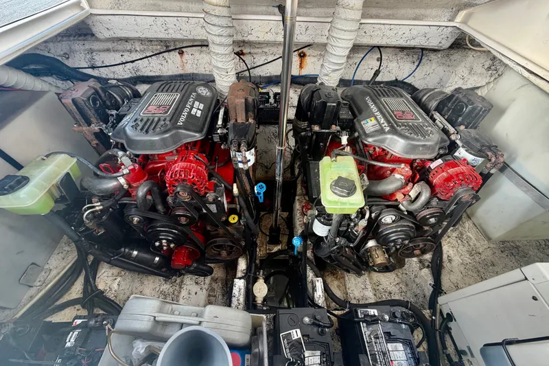 Slide: The Image of Engine compartment of a 2006 Rinker 320 Express Cruiser with dual Volvo Penta engines. - 44