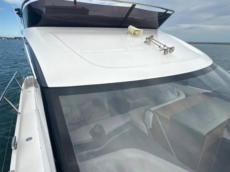 Slide: The Image of The 2023 Princess F45 features a modern design with large windows and sleek lines. - 22