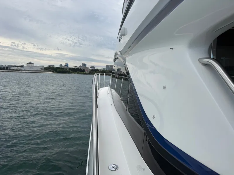 Slide: The Image of Side view of the Princess F45 yacht on the water. - 15