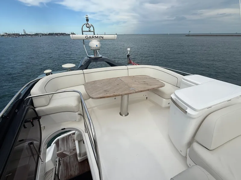 Slide: The Image of The image shows the deck of a 2023 Princess F45 yacht with a sleek seating area. - 29