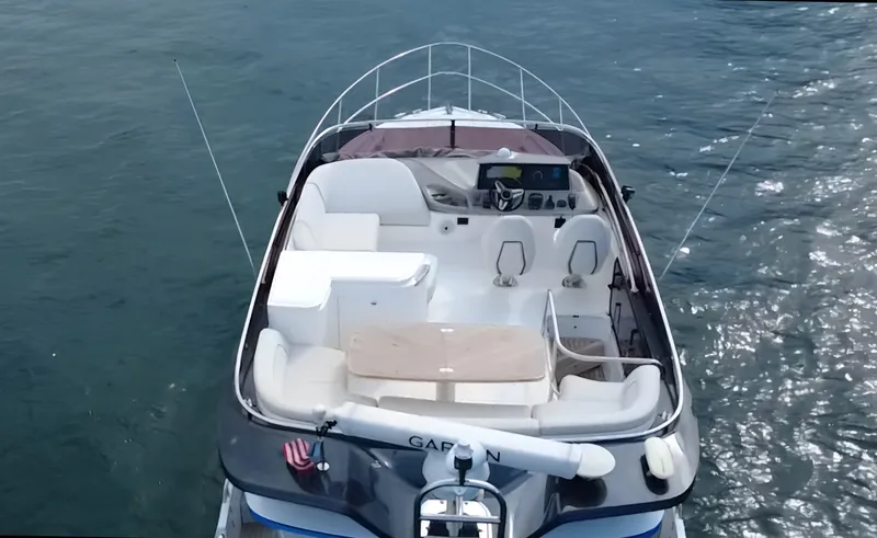 Slide: The Image of The 2023 Princess F45 features a sleek design with a spacious deck and modern amenities. - 5