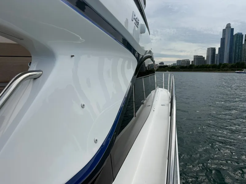 Slide: The Image of Side view of the Princess F45 yacht on the water. - 14