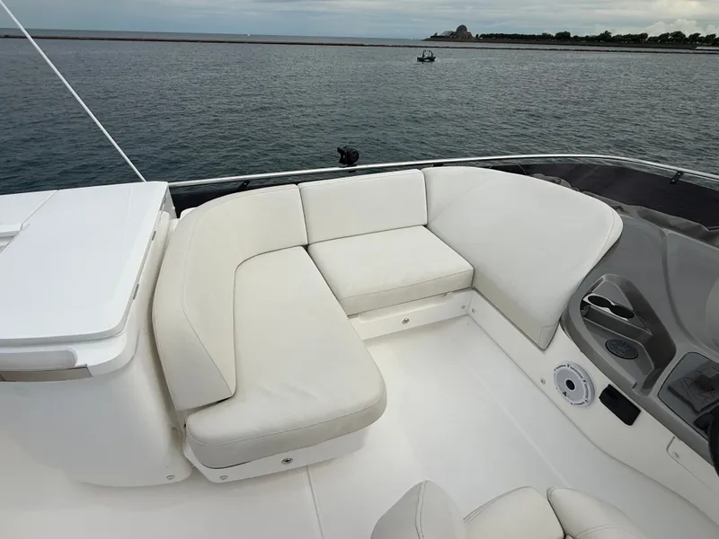Slide: The Image of The image shows the deck of a 2023 Princess F45 with white cushioned seating. - 31