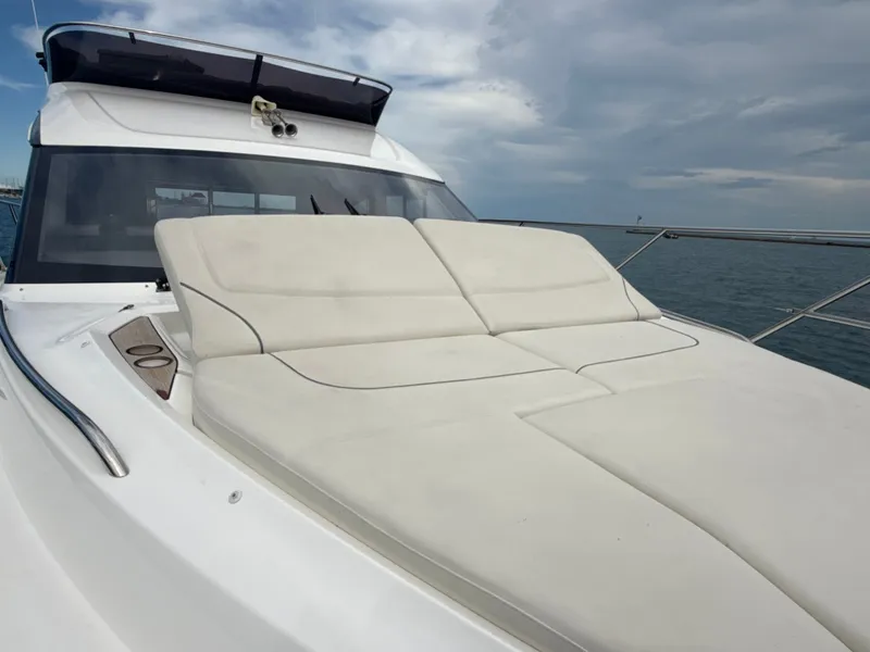 Slide: The Image of The 2023 Princess F45 features a sleek sun deck with comfortable lounging areas. - 19