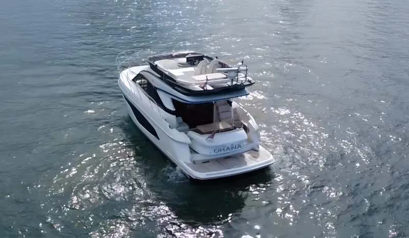 Slide: The Image of The 2023 Princess F45 cruises on calm waters, featuring a sleek, modern design. - 3