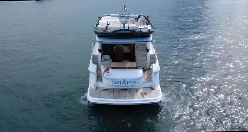 Slide: The Image of The 2023 Princess F45 cruises on calm waters. It features a sleek design and spacious aft platform. - 4