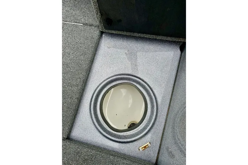 Slide: The Image of 2009 Ranger 620VS Fisherman boat interior with circular compartment detail. - 52