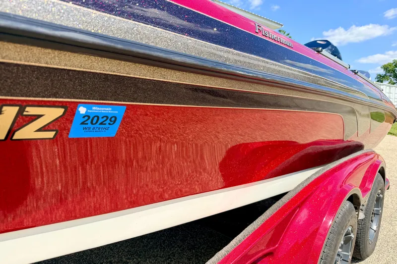 Slide: The Image of 2009 Ranger 620VS Fisherman boat with Wisconsin registration sticker, red and silver detailing. - 15