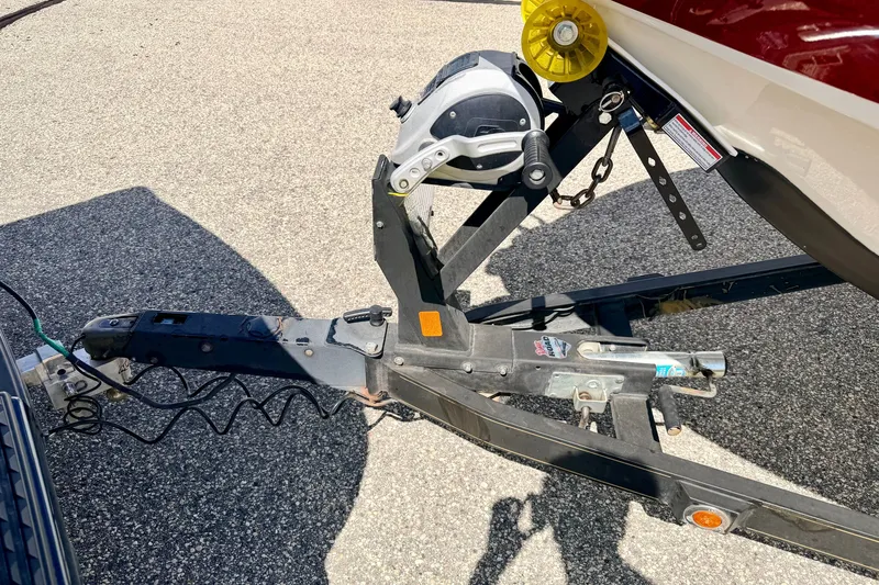 Slide: The Image of Trailer hitch of a 2009 Ranger 620VS Fisherman boat on pavement. - 77