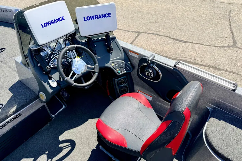 Slide: The Image of 2009 Ranger 620VS Fisherman boat cockpit with Lowrance electronics and steering wheel. - 72