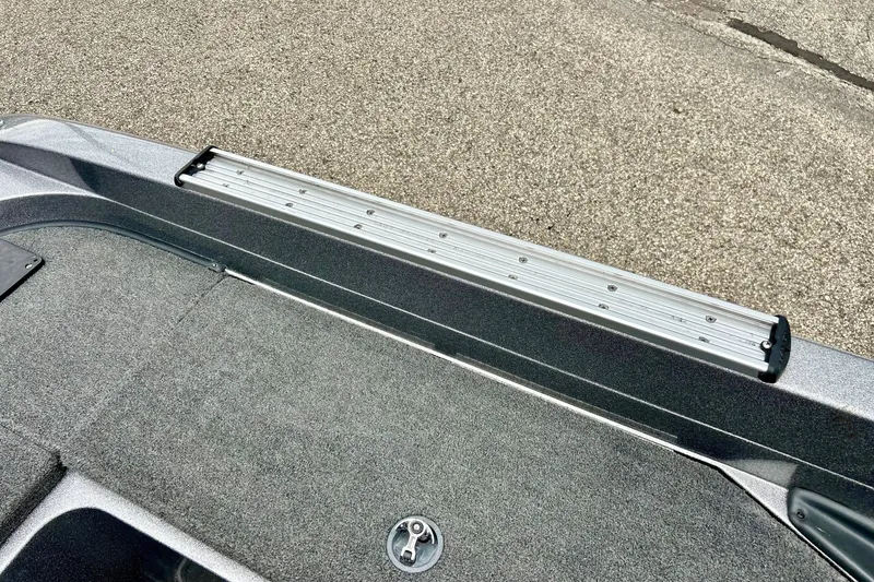 Slide: The Image of 2009 Ranger 620VS Fisherman boat deck with aluminum rail and carpeted surface. - 46