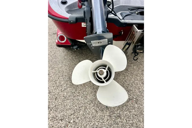 Slide: The Image of Close-up of a 2009 Ranger 620VS Fisherman boat propeller on a textured surface. - 24