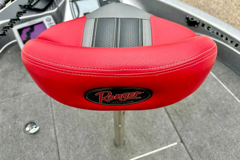 Slide: The Image of Red seat of 2009 Ranger 620VS Fisherman boat, featuring logo and sleek design. - 57