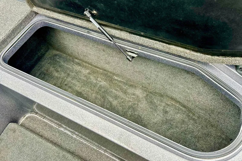 Slide: The Image of Open storage compartment in a 2009 Ranger 620VS Fisherman boat. - 37