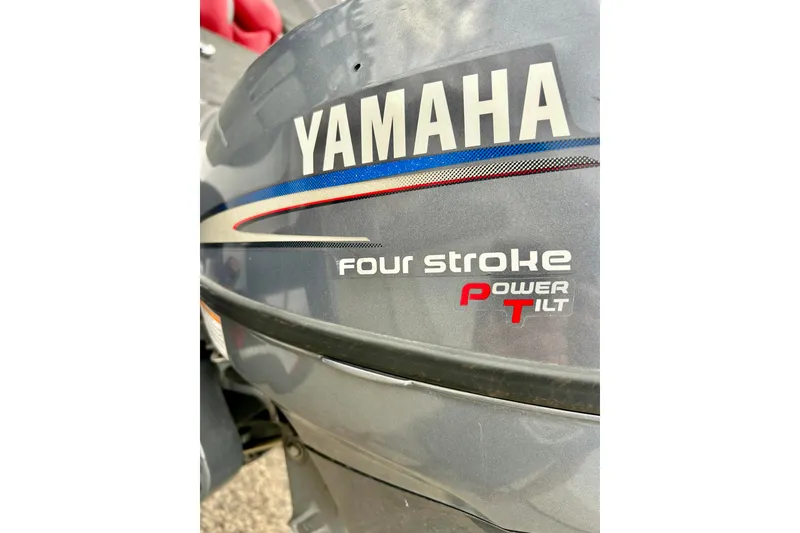 Slide: The Image of Yamaha four-stroke outboard motor with power tilt on 2009 Ranger 620VS Fisherman boat. - 23