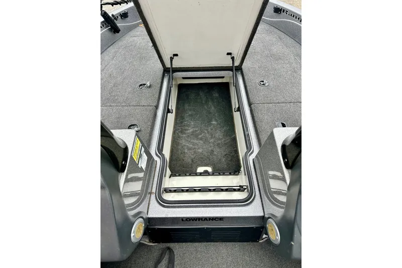 Slide: The Image of 2009 Ranger 620VS Fisherman boat storage compartment with Lowrance equipment. - 49